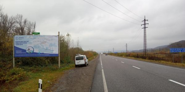 Билборд B в Хусте, 6x3  м.Хуст, Вул. Волошина, виїзд з міста траса  Івано-Франківськ-Мукачево, в сторону м. Мукачево фото 1