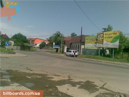 Білборд, Бігборд (Борд)  A у Тячеві м. Тячів перехрестя вул. Незалежності, Шапошнікова та площі Карла Маркса, напроти автобусної стоянки Фото 1