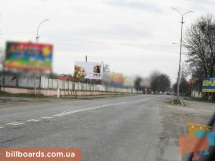 Білборд, Бігборд (Борд)  B у Тячеві м. Тячів вул.Армійська, біля АЗС, ресторну, меблевого салону, автомийки вїзд в місто з сторони м.Хуст, Ужгород, біля стадіону Фото 1