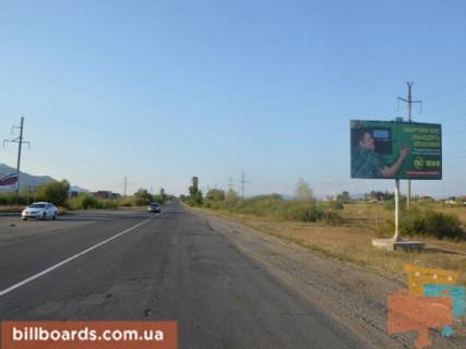 Білборд, Бігборд (Борд)  A у Хусті м.Хуст обїзна дорога, в сторону м.Мукачево, трасса Рогатин - Мукачево (біля ринку) Фото 1