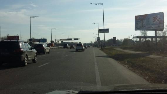 Билборд A в Киеве Столичное шоссе 104, за 100 м до заезда в ТРЦ Атмосфера, Авторынок Центральный Чапаевка, въезд в Конча Заспу фото 1