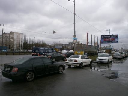 Білборд, Бігборд (Борд)  A у Києві, щит  Кільцева дорога, км 2+955 справа (паркінг "Тиса", Приват Банк, "Фора", автосалон "Skoda"), в напрямку Одеське шосе Фото 1