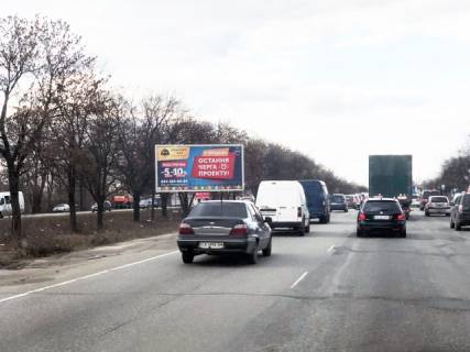 Призма A в Киеве Кільцева дорога (СТО, Авторинок Автоцентр Жуляни, АЗС Shell, АТБ-маркет, ЖК "Жуляни", ТЦ Аракс), на розподілювачі, 150 м до Жулянський міст - 330068 фото 1