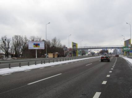 Білборд, Бігборд (Борд)  B у Києві, щит  Новообухівська траса (Дніпровське шосе), в напрямку з м. Київ, 150м перед  ТЦ "Мегамаркет", навпроти заправки БРСМ,7км+200м Фото 1
