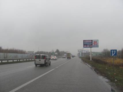 Білборд, Бігборд (Борд)  A у Києві, щит  Житомирське шосе , в напрямку з м.Київ, після с.Міла ( перед заправкою "UPG"), 7км+700м Фото 1