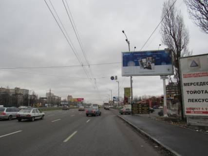 Білборд, Бігборд (Борд)  A у Києві, призма  Кільцева дорога, км 2+955 (біля автосалона, Ашан,Ельдорадо, готель "Тиса", АЗС "БРОМ", Технополіс), в напрямку Одеське шосе Фото 1