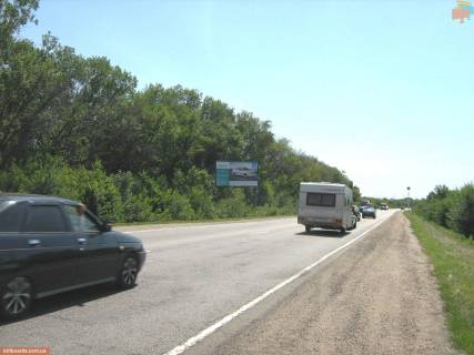 Билборд B в Запорожье Траса Харків-Сімферополь-Алушта-Ялта (302 +700 м праворуч) 1,7 км від пам’ятника «Автомобілістам», 150 м. до заправки «WOG» у напрямку м. Мелітополь фото 1