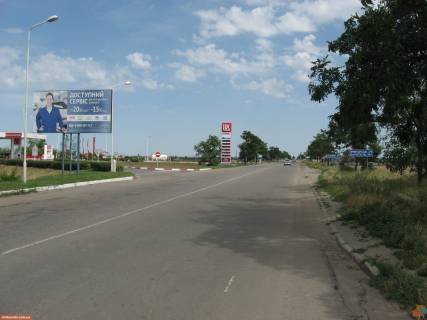 Билборд B в Мелитополе вул. Дзержинського (виїзд з міста у напрямку м. Бердянськ, біля заправки "Лукойл", траса Е58) фото 1