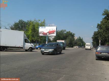 Билборд B в Запорожье вул. Чарівна (перший Шевченківський м-рн), напроти жилого будинку № 143А, ліворуч фото 1