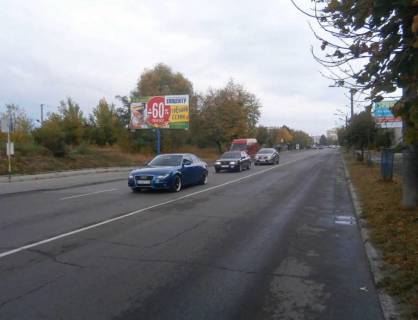 Билборд B в Ивано-Франковске, 3х6  Петлюри (перед вул.Коновальця) СМ "Велмарт"    перед ОККО фото 1