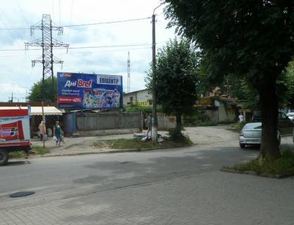Билборд A в Ивано-Франковске, 3х6  Чорновола - Довженка кільце базар    правий фото 1