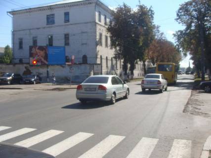 Білборд, Бігборд (Борд)  A у Полтаві вул. Соборності (Жовтнева) (ограда технического университета) Фото 1