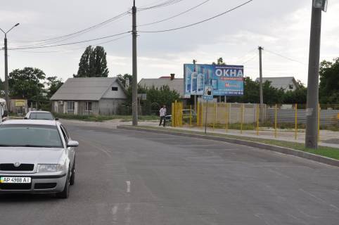 Билборд  в Мелитополе БР 105 A       ул В. Интернационолистов,  14   (ДжонДир) фото 1