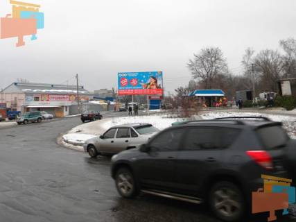 Билборд A в Изюме центр, рынок   ул.Кап.Орлова-ул.Гагарина (перекресток) фото 1
