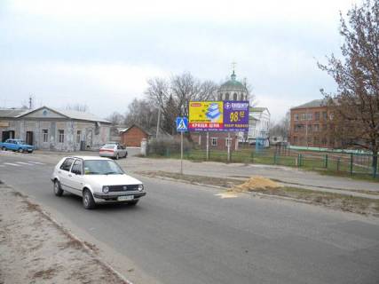 Білборд, Бігборд (Борд)  A у Ізюмі, 3х6  центр, поворот                ул.Фрунзе Фото 1