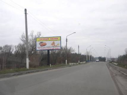 Билборд B в Изюме, 3х6    ул.20 лет Октября (вул. Суходольська)  (в центр..) фото 1