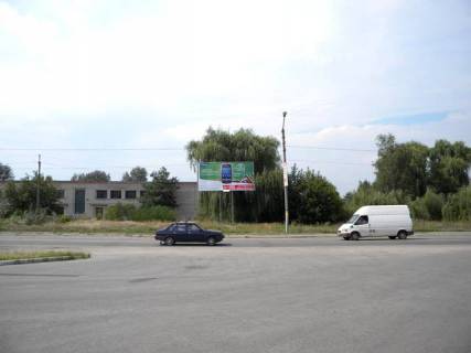 Білборд, Бігборд (Борд)  A у Ізюмі, 3х6  трасса, возле АЗС вул. Шмідта Фото 1