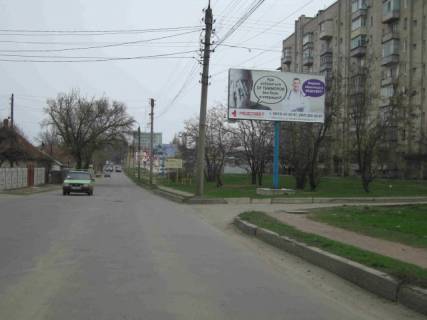 Билборд A в Мелитополе, 6x3  Ул. Дзержинского  95. МРЭО (запад) фото 1
