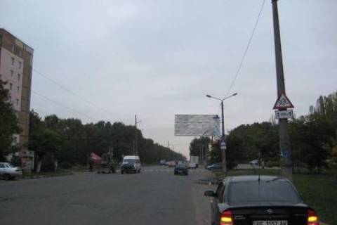 Билборд A в Николаеве, 3x6  вул. Космонавтів, 51 (74) консольний фото 1