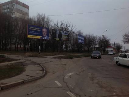 Билборд A в Николаеве, 3x6  Богоявленський просп. (Жовтневий просп.) ріг вул. Торгової 47 школа фото 1