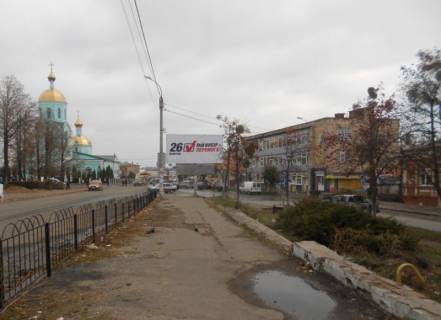Білборд, Бігборд (Борд)  B у Умані, 6х3  (вул.Радянська)  вул. Небесної сотні, 14, на развилці з вул. Гайдамацька (вул.Рафаїла Чорного) (базар біля швейної фабрики), сторона Б Фото 1