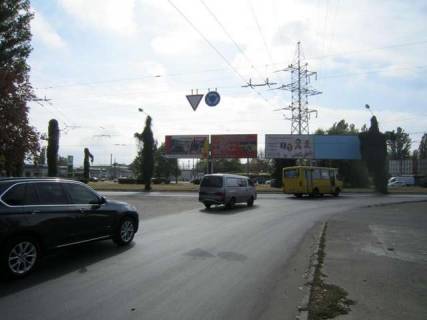 Билборд A в Одессе, 3х6  вул.Космонавтів - вул. 25 Чапаївської Дивізії, 9Б (права сторона лівої конструкції)  фото 1