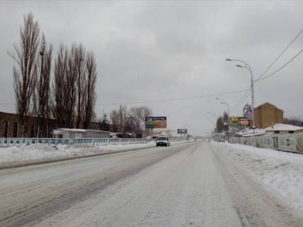 Билборд B в Вышгороде, 3.2x6  Набережна, 150м до "Сільпо" напрямок у Київ фото 1