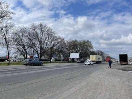 Білборд, Бігборд (Борд)  A у Києві, 3х6  Кільцева дорога на розподільчій смузі перед розворотом, напроти вулиця Садова , по направленню від Одеської прощі   Фото 1