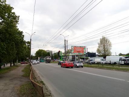 Билборд A в Чернигове, 116а  проспект Миру х вул. Кошового (ринок, АЗС ОККО, СТО Мотор) (сторона А) фото 1