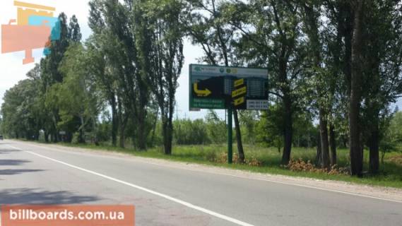 Білборд, Бігборд (Борд)  A у Вишгороді, 6x3  Вул. Шолуденка, поворот з вул. Ватутіна, напрямок траси “Київ-Овруч” Фото 1