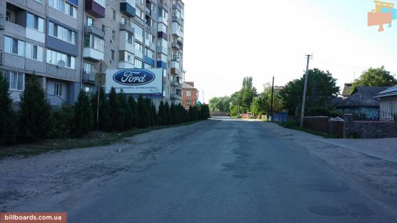 Билборд B в Баре вул. Комарова, поряд стадіон, будівельний магазин фото 1