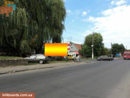 Billboard B in Beregovo st.Cervonoarmijs'ka (Market Furset), napram-Hust Photo 1