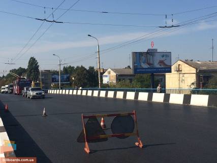 Білборд, Бігборд (Борд)  A у Луцьку, 3*6  міст вул.Перемоги-Соборності (2й від від РайфайзенБанк) Фото 1