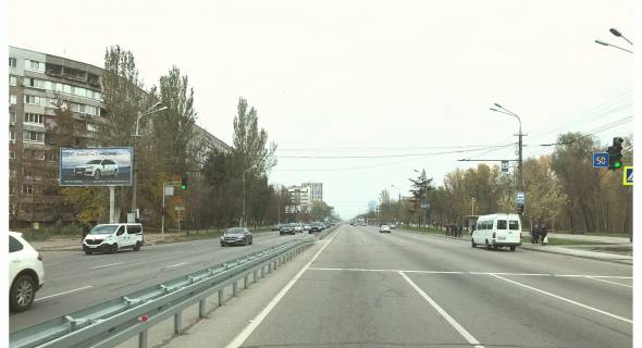 Билборд B в Днепр (Днепропетровск), 3,2х6,2  Набережна Перемоги вул., 100 - Перемоги пл., в центр фото 1