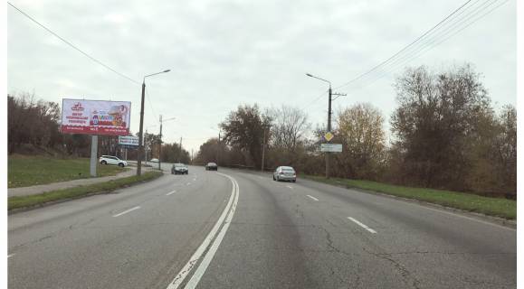 Билборд B в Днепр (Днепропетровск), 3х6  Космічна вул. - Михайла Комарова (Крошки) вул., з центру фото 1