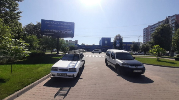 Білборд, Бігборд (Борд)  B у Хмельницькому, 6х3  вул. Трудова. ТЦ Вудмол. Авторинок Фото 1