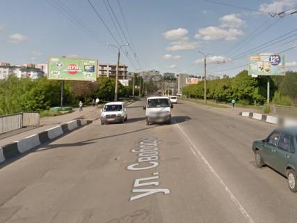 Билборд B в Хмельницком, 6х3  вул.Свободи, мост через р.П.Буг. неподалік: автосалон Ниссан (центр) фото 1