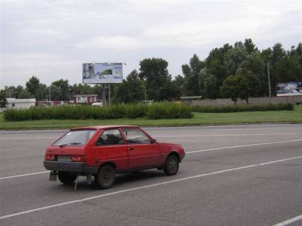 Білборд, Бігборд (Борд)  A у Запоріжжі, 6x3  Набережна магістраль - вул. Українська (коло), обличчям на вул. Українську Фото 1