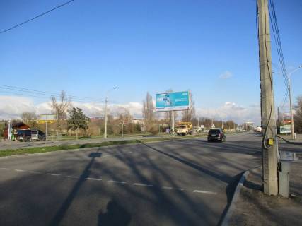 Білборд, Бігборд (Борд)  B у Запоріжжі Набережна магістраль  – каскад «Веселка», напр. руху до вокзалу (призматрон) Фото 1