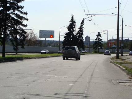 Билборд B в Запорожье вул.Перемоги,129а - напроти БК "Титан"; рядом с АЗС ВОГ, ст.Б фото 1