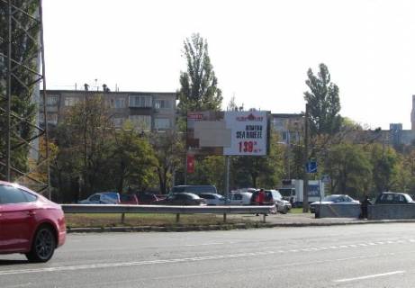 Білборд, Бігборд (Борд)  B у Києві Братиславська вул., 12 (навпроти) - Анатолія Солов’яненка вул. (Олександра Бойченка)., рух до Броварського пр., ліворуч Фото 1