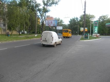 Білборд, Бігборд (Борд)  B у Сумах, 3х6  вул.Кірова / вул. Лебединська. Розв'язка, аеропорт Фото 1