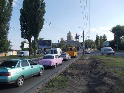Білборд, Бігборд (Борд)  B у Сумах, 3х6  ул.Калинина / вул.20 років Перемоги / міст, з центру Фото 1