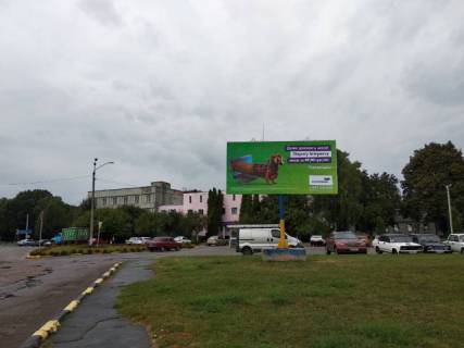 Билборд A в Чуднове, 6x3  Чуднів в. Соборна,центр міста, ст А фото 1