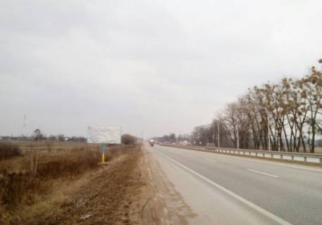 Билборд B в трассах Житомира, 6x3  Траса Київ-Житомир. Біля заправки АВАНТАЖ,поряд Макдональдс,ВОГ,  напрямок з Житомира на Київ ст.Б фото 1