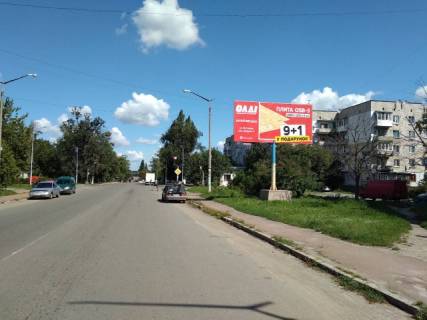 Билборд A в Малине, 6x3  Малин в. Гагаріна 29, біля єдиного в місті світлофора, поряд паперова фабрика фото 1