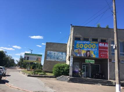 Билборд A в Емильчине, 6x3  Ємільчино в.Леніна, центр міста. Фасад Будинка культури фото 1