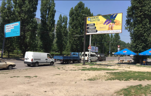 Билборд A в Николаеве, 3*6  вул Космонавтов  -  ріг пр. Миру _ супертмаркет АТБ, ринок (сторона A) фото 1