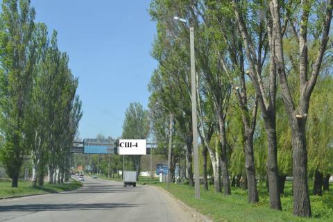 Билборд A в Каменское (Днепродзержинск), 3*6  вул.Січеславський шлях (вул.Дніпропетровська), теплотрасса (щиты, вышка) в сторону Каменского фото 1