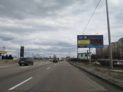 Билборд A в Киеве Шухевича пр. (колиш. Ватутіна), 26-30, навпроти АЗС БРСМ-Нафта, з центру фото 1